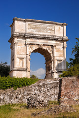 Fototapeta premium Arch of Titus on Roman Forum in Rome, Italy