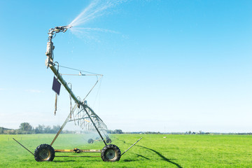 spray water machine in grassland