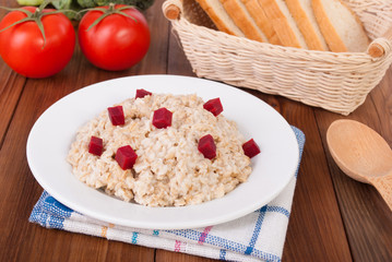 Oatmeal in a bowl on the table.