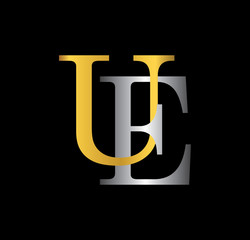 UE initial letter with gold and silver