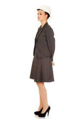 Architect business woman wearing white helmet