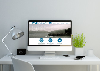 modern clean workspace showing web design website on screen