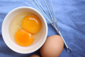 Eggs in a bowl with whisk