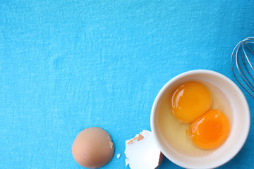 Eggs in a bowl with whisk