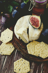 figs with cheese and honey , selective focus