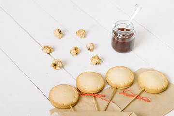 Homemade pie pops with jam on the white vintage  table...