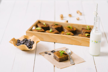 Chocolate  brownie on the white vintage table. 