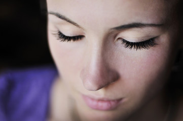 Close up macro white girl portrait with long lashes