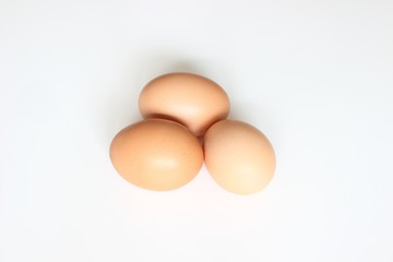 Three eggs on white backgrund