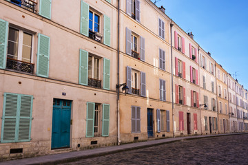 Fototapeta na wymiar Picturesque cobbled street in Paris, France