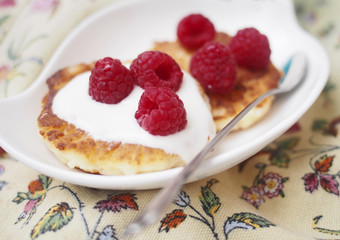 Cheesecake on a plate with wild berries