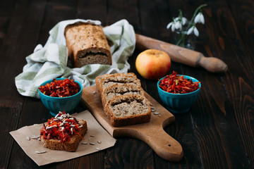 Homemade integral bread and vitamin salad on the rustic table. 