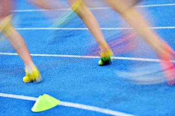 Blurred athletes on the sprint track
