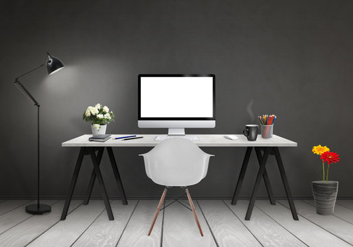 Modern office interior with computer on desk, plants, lamp, chair, books, black wall and white wooden floor.