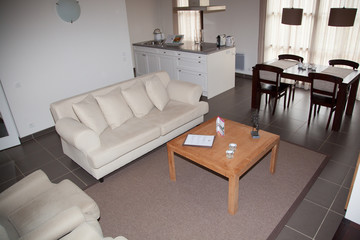 Cosy flat - white sofa in white  living room