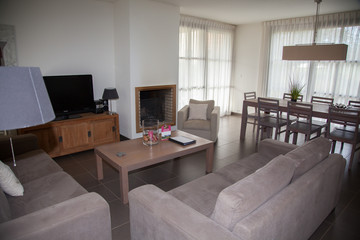 Photo of new design living room with cosy furniture