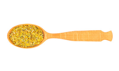 Dry calendula in spoon
