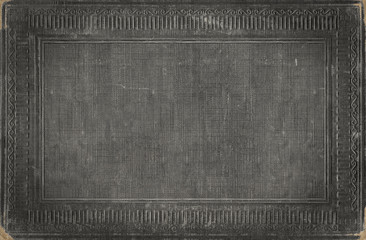 
Grey vintage background from distress fabric texture with antique ornamental frame