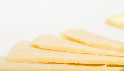 Closeup of delicious sliced parmesan cheese.