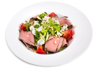 Warm roast beef salad with goat cheese.