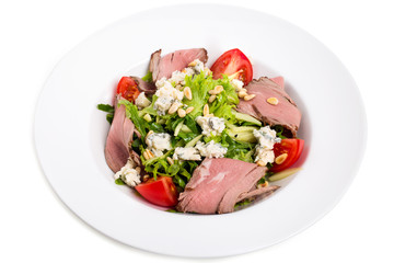 Warm roast beef salad with goat cheese.