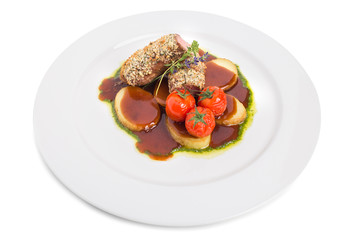 Breaded pork fillet with tomatoes confit.