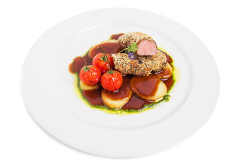 Breaded pork fillet with tomatoes confit.