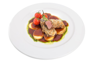 Breaded pork fillet with tomatoes confit.