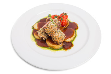 Breaded pork fillet with tomatoes confit.