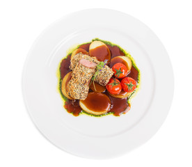 Breaded pork fillet with tomatoes confit.