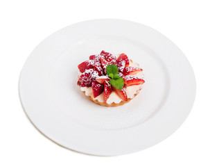Delicious strawberry shortcake with whipped cream.