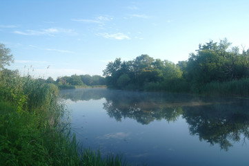 Morning landscape with fog on the river