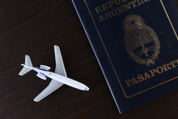 passport and toy plane 
