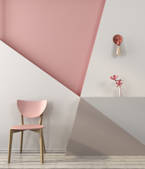 Pink chair on the background of a geometric wall