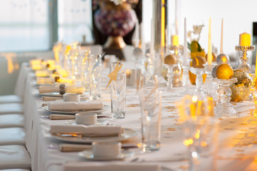 Beautifully decorated table with glass and plate