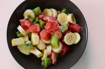 Bowl of healthy fresh fruit salad