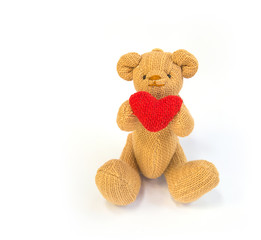 Brown teddy bears with red hearts