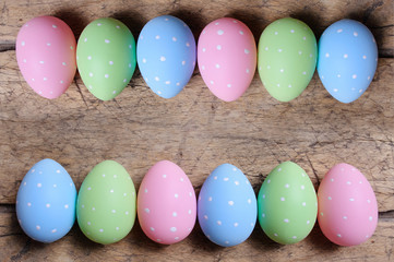 Easter eggs on wooden background
