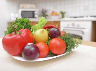Vegetables on the plate in kitchen.