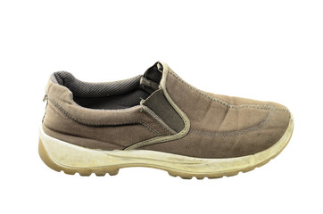 Used brown canvas casual shoes on a white background