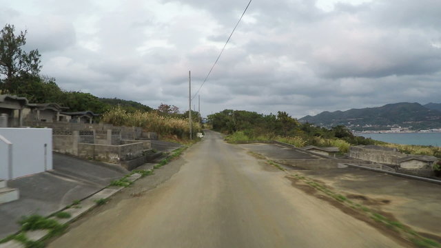 Driver's POV through the oceanfront cemetery in Sesoko Island, Okinawa.