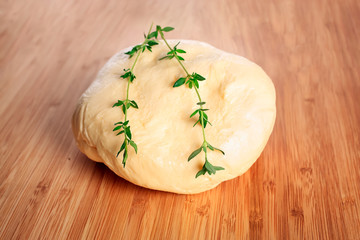 Fresh rustic sweet butter on a wooden board