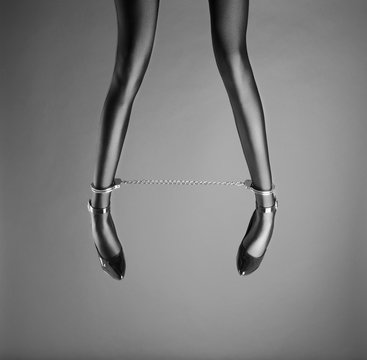 Beautiful Woman Legs With Ankle Cuffs