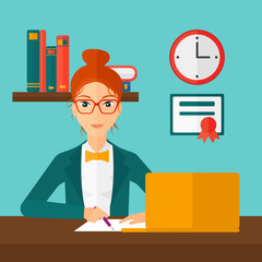 Woman using laptop for education.