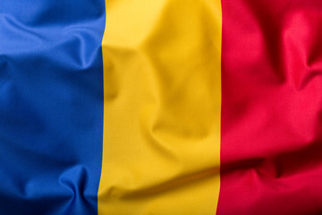 Flag of Romania, national country symbol, wave flag.