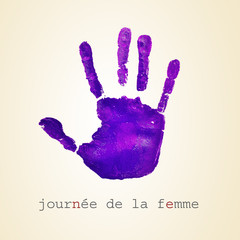 violet handprint and text journee de la femme, womens day in fre