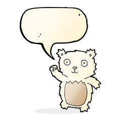 cartoon waving polar bear cub with speech bubble