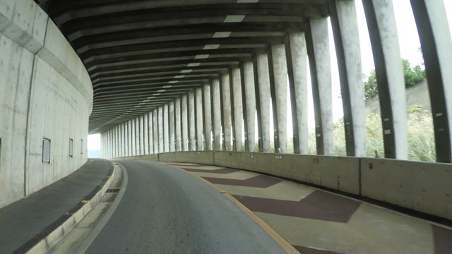 Drive through the tunnel and bridge connecting Ikeijima, Okinawa.