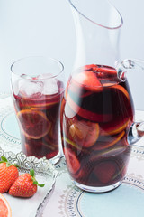 Pitcher and glass of popular wine -based beverage - Sangria.