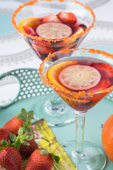 Martini glasses with sangria.